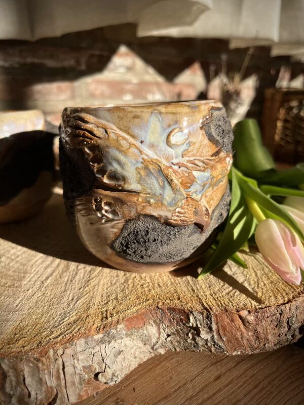 TAZA · Luna · Águila